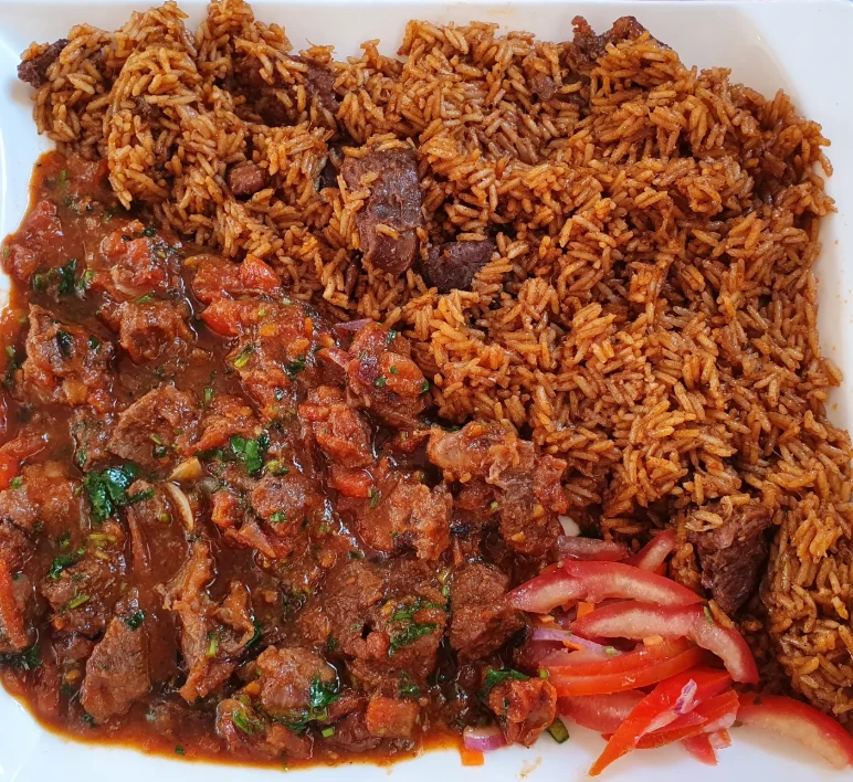KulaTam pilau with beef stew and kachumbari